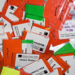 Pile of used conference badges UK